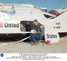 NASA engineer Wayne Peterson from the Johnson Space Center reviews postflight checklists following a spectacular flight of the X-38 Vehicle 131R.