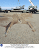 Skid marks in the lakebed show the landing path after the successful eighth free flight test mission of the NASA X-38.